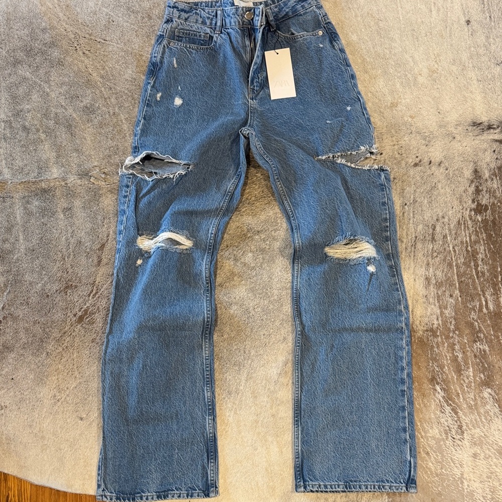 Zara Women’s Relaxed Fit Ripped Blue Jeans